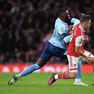 Arsenal vs. Brentford: Trossard and Dasilva Clash in Intense Premier League Match