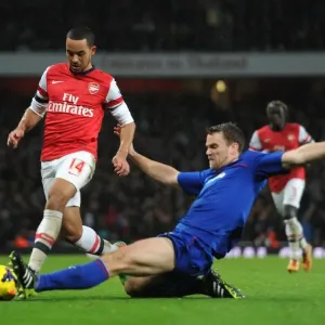 Arsenal vs. Cardiff: Walcott vs. Turner - Intense Battle in the Premier League Arsenal vs. Cardiff: Walcott vs. Turner - Intense Battle in the Premier League