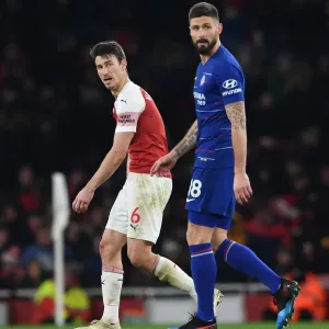 Arsenal vs. Chelsea: Koscielny and Giroud Clash in the Premier League