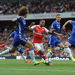 Arsenal vs. Chelsea Showdown: Walcott vs. Luiz and Cahill - A Battle at Emirates