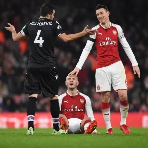 Arsenal vs. Crystal Palace: A Light-Hearted Moment Between Jack Wilshere, Laurent Koscielny, and Luka Milivojevic Arsenal vs. Crystal Palace: A Light-Hearted Moment Between Jack Wilshere, Laurent Koscielny, and Luka Milivojevic