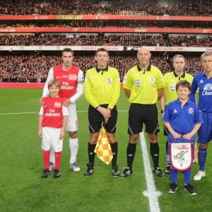 Arsenal vs. Everton: Premier League Clash - Robin van Persie and Phil Neville Lead Teams Out at Emirates Stadium (December 2011) Arsenal vs. Everton: Premier League Clash - Robin van Persie and Phil Neville Lead Teams Out at Emirates Stadium (December 2011)