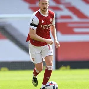Arsenal vs Fulham: Emirates Stadium Showdown Amidst COVID-19 Restrictions (April 2021)