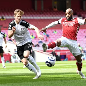 Arsenal vs Fulham: Lacazette Faces Off Against Anderson Amid Empty Emirates Stadium (April 2021)