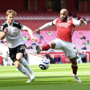 Arsenal vs Fulham: Lacazette Faces Off Against Anderson Amid Empty Emirates Stadium (April 2021)