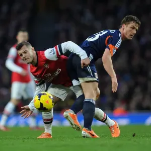 Arsenal vs Fulham: Wilshere vs Parker's Intense Battle in the Premier League Arsenal vs Fulham: Wilshere vs Parker's Intense Battle in the Premier League