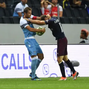 Arsenal vs. Lazio: Stephan Lichtsteiner and Senad Lulic Clash in Pre-Season Friendly Arsenal vs. Lazio: Stephan Lichtsteiner and Senad Lulic Clash in Pre-Season Friendly