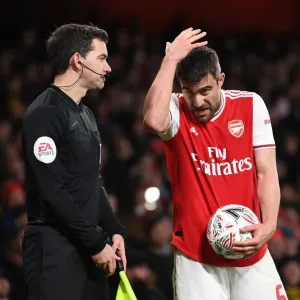 Arsenal vs Leeds United: Sokratis Discusses with the Linesman during FA Cup Clash at Emirates Stadium Arsenal vs Leeds United: Sokratis Discusses with the Linesman during FA Cup Clash at Emirates Stadium