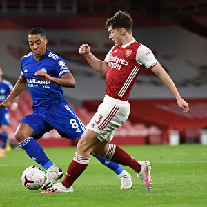 Arsenal vs Leicester City: Tierney vs Tielemans - A Battle at Emirates Amidst Empty Stands (2020-21 Premier League)