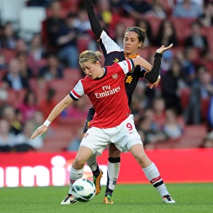 Arsenal vs Liverpool: A Battle of Wills - Ellen White vs Fara Williams in FA WSL Action
