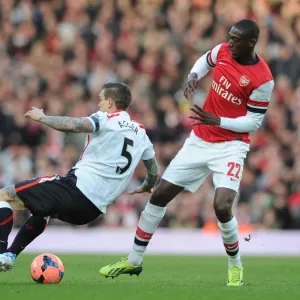 Arsenal vs. Liverpool: Clash in the FA Cup Fifth Round - Yaya Sanogo vs. Daniel Agger Arsenal vs. Liverpool: Clash in the FA Cup Fifth Round - Yaya Sanogo vs. Daniel Agger