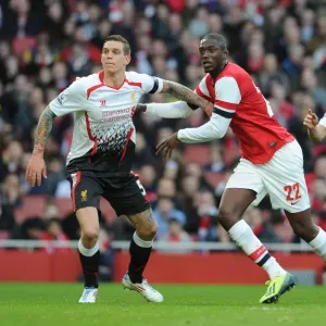 Arsenal vs. Liverpool: Clash of Titans - Sanogo vs. Agger in FA Cup Showdown Arsenal vs. Liverpool: Clash of Titans - Sanogo vs. Agger in FA Cup Showdown