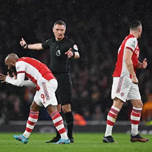 Arsenal vs. Liverpool: Intense Moment Between Lacazette and Xhaka Amidst Premier League Controversy