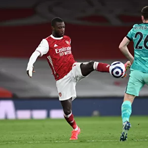 Arsenal vs. Liverpool: Pepe vs. Robertson - Intense Battle in the Premier League