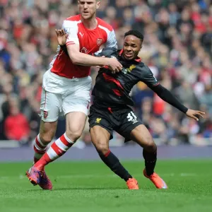 Arsenal vs. Liverpool Showdown: Mertesacker vs. Sterling