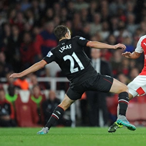 Arsenal vs. Liverpool Showdown: Ozil vs. Leiva Clash in the 2015/16 Premier League