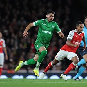 Arsenal vs Ludogorets: Theo Walcott Clashes with Jose Luis Palomino in the 2016-17 UEFA Champions League