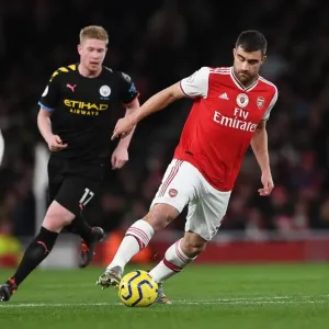 Arsenal vs Manchester City: Sokratis vs De Bruyne - Premier League Clash at Emirates Stadium (December 2019) Arsenal vs Manchester City: Sokratis vs De Bruyne - Premier League Clash at Emirates Stadium (December 2019)