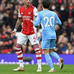 Arsenal vs Manchester City: Ben White and Bernardo Silva in Deep Conversation during the 2021-22 Premier League Clash at Emirates Stadium