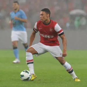 Arsenal vs Manchester City: Oxlade-Chamberlain in Action during 2012 Pre-Season Clash in Beijing
