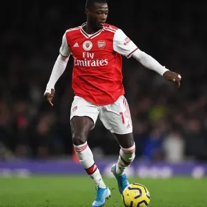 Arsenal vs Manchester City: Pepe in Action at the Emirates Stadium (2019-20 Premier League) Arsenal vs Manchester City: Pepe in Action at the Emirates Stadium (2019-20 Premier League)