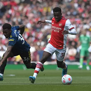Arsenal vs Manchester United: Eddie Nketiah Clashes with Anthony Elanga in Intense Premier League Showdown