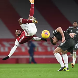 Arsenal vs Manchester United: Lacazette Tangles with Maguire in Empty Emirates Stadium