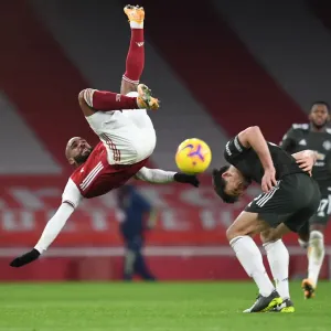 Arsenal vs Manchester United: Lacazette Tangles with Maguire in Empty Emirates Stadium