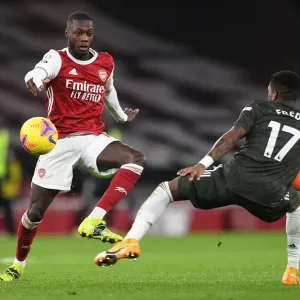 Arsenal vs Manchester United: Pepe Tackles Pressure Amid Empty Emirates Stadium (Premier League 2020-21)