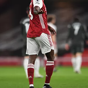 Arsenal vs Manchester United: Thomas Partey in Action at Emirates Stadium during the 2021-22 Premier League Match (Behind Closed Doors)