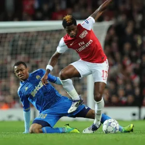 Arsenal vs Marseille: Clash between Alex Song and Jordan Ayew in the 2011-12 UEFA Champions League Arsenal vs Marseille: Clash between Alex Song and Jordan Ayew in the 2011-12 UEFA Champions League