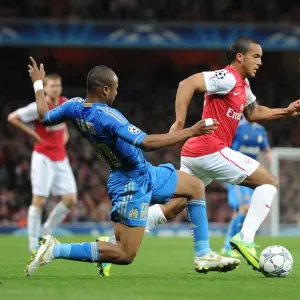 Arsenal vs. Marseille: Theo Walcott Clashes with Souleymane Diawara in the 2011-12 UEFA Champions League Arsenal vs. Marseille: Theo Walcott Clashes with Souleymane Diawara in the 2011-12 UEFA Champions League
