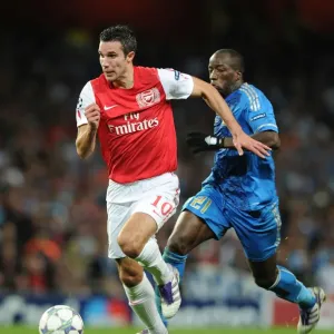 Arsenal vs Marseille: Van Persie vs Diawara - Clash of the Titans in the 2011-12 UEFA Champions League Arsenal vs Marseille: Van Persie vs Diawara - Clash of the Titans in the 2011-12 UEFA Champions League