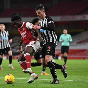 Arsenal vs Newcastle United: Bukayo Saka Faces Off Against Ciaran Clark Amid Empty Emirates Stadium (Premier League 2020-21)