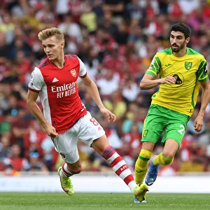 Arsenal vs Norwich City: Martin Odegaard Clashes with Pierre Lees-Melou in the 2021-22 Premier League