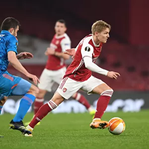 Arsenal vs Olympiacos: Clash of Martin Odegaard and Sokratis in Empty Europa League Match, London, 2021