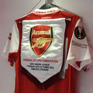 Arsenal vs PSV Eindhoven: Europa League Clash - Arsenal Changing Room Pennant Arsenal vs PSV Eindhoven: Europa League Clash - Arsenal Changing Room Pennant