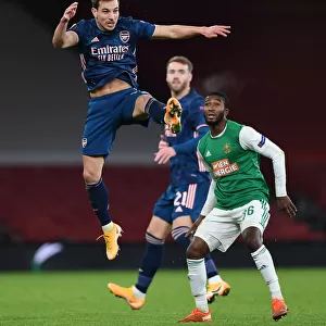 Arsenal vs Rapid Wien: Tense Moment as Cedric Soares Clears Ball in UEFA Europa League Clash