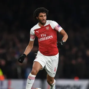 Arsenal vs. S.S.C. Napoli - Mohamed Elneny in Action during the 2018-19 Europa League Quarterfinal First Leg at Emirates Stadium Arsenal vs. S.S.C. Napoli - Mohamed Elneny in Action during the 2018-19 Europa League Quarterfinal First Leg at Emirates Stadium