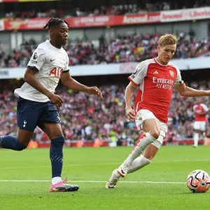 Arsenal vs. Tottenham Clash: Martin Odegaard vs. Destiny Udogie at Emirates Stadium (2023-24) Arsenal vs. Tottenham Clash: Martin Odegaard vs. Destiny Udogie at Emirates Stadium (2023-24)