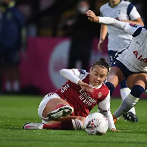 Arsenal vs. Tottenham: A Fierce FA Cup Battle at Meadow Park