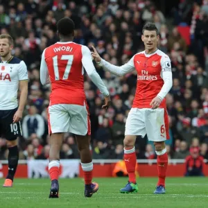 Arsenal vs. Tottenham: Koscielny Coaches Iwobi during Intense Premier League Clash (2016-17)