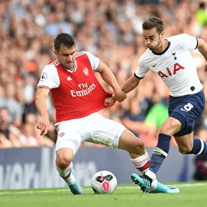 Arsenal vs. Tottenham: Sokratis Clashes with Harry Winks in the 2019-20 Premier League Showdown