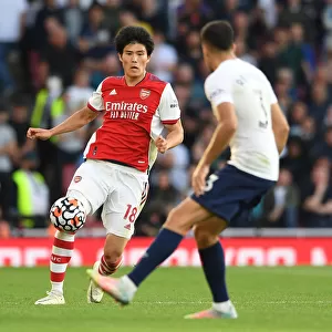 Arsenal vs. Tottenham: Tomiyasu in Action at the Emirates Stadium - Premier League 2021-22