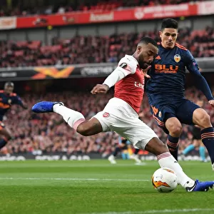 Arsenal vs Valencia: Alex Lacazette Faces Off Against Facundo Roncaglia in the 2018-19 Europa League Semi-Final First Leg