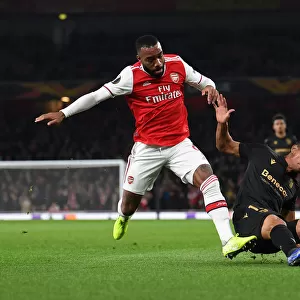 Arsenal vs. Vitoria Guimaraes: Lacazette Tackled in Europa League Clash