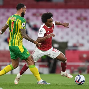 Arsenal vs. West Bromwich Albion: A Battle at Emirates Stadium Amidst the Pandemic (May 2021)