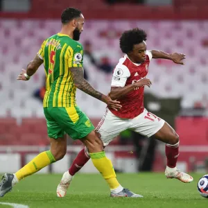 Arsenal vs. West Bromwich Albion: A Battle at Emirates Stadium Amidst the Pandemic (May 2021)