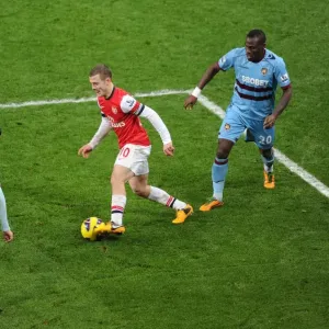 Arsenal vs. West Ham: Wilshere Clashes with Tomkins and Demel