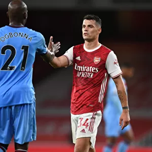 Arsenal vs. West Ham: Xhaka and Ogbonna Share a Moment after Premier League Clash